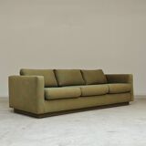 Pierre Frey modernist bench in green and gold patterned fabric