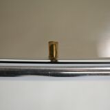 Living table. chrome metal, curved smoked glass slab, france, circa 1970.