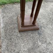1930s Art Deco round side table in painted brown wood — column leg base