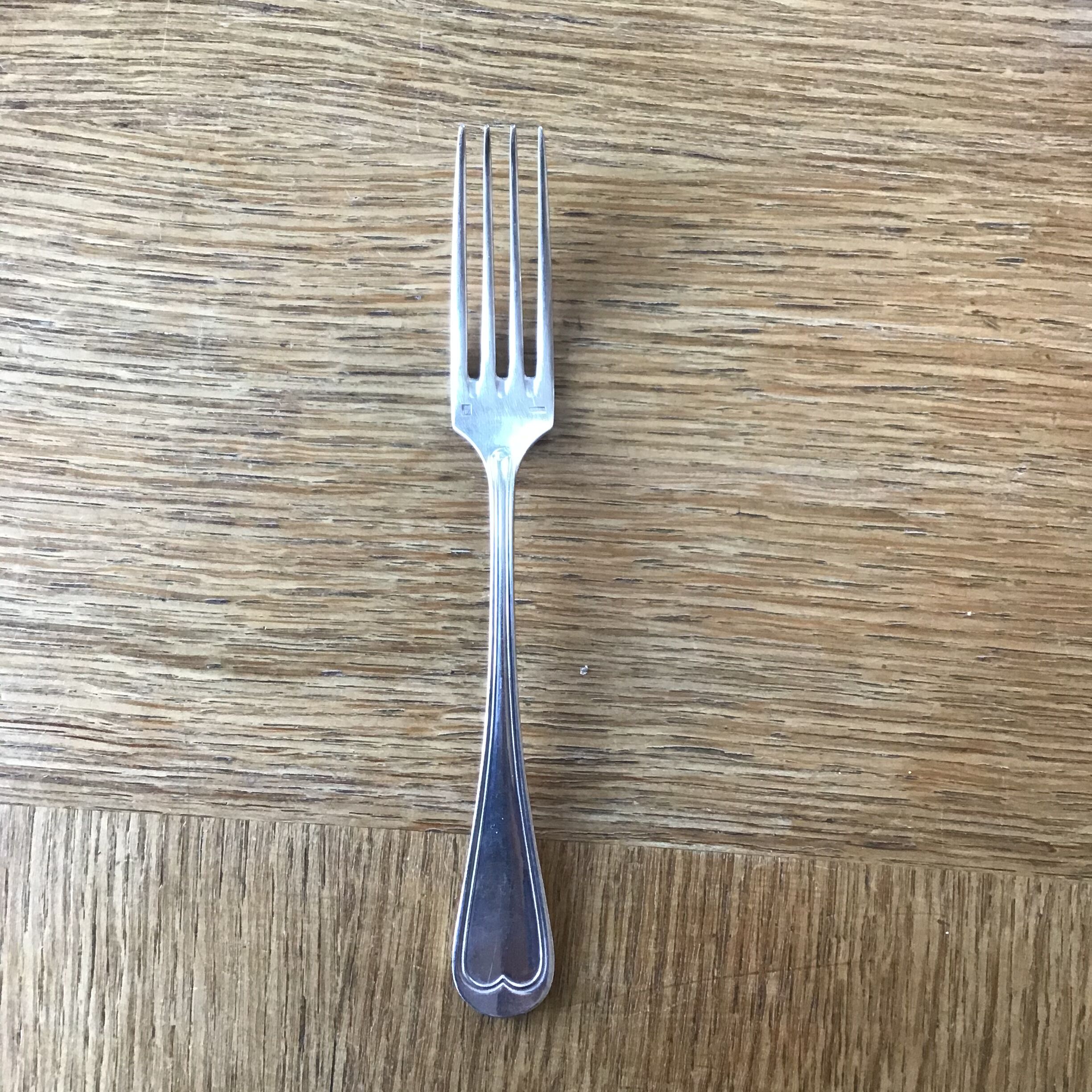 Set of 12 silver metal in their wallet