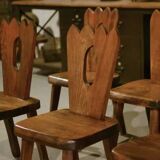 8 chaises brutalistes en orme massif par Aranjou 1950’s