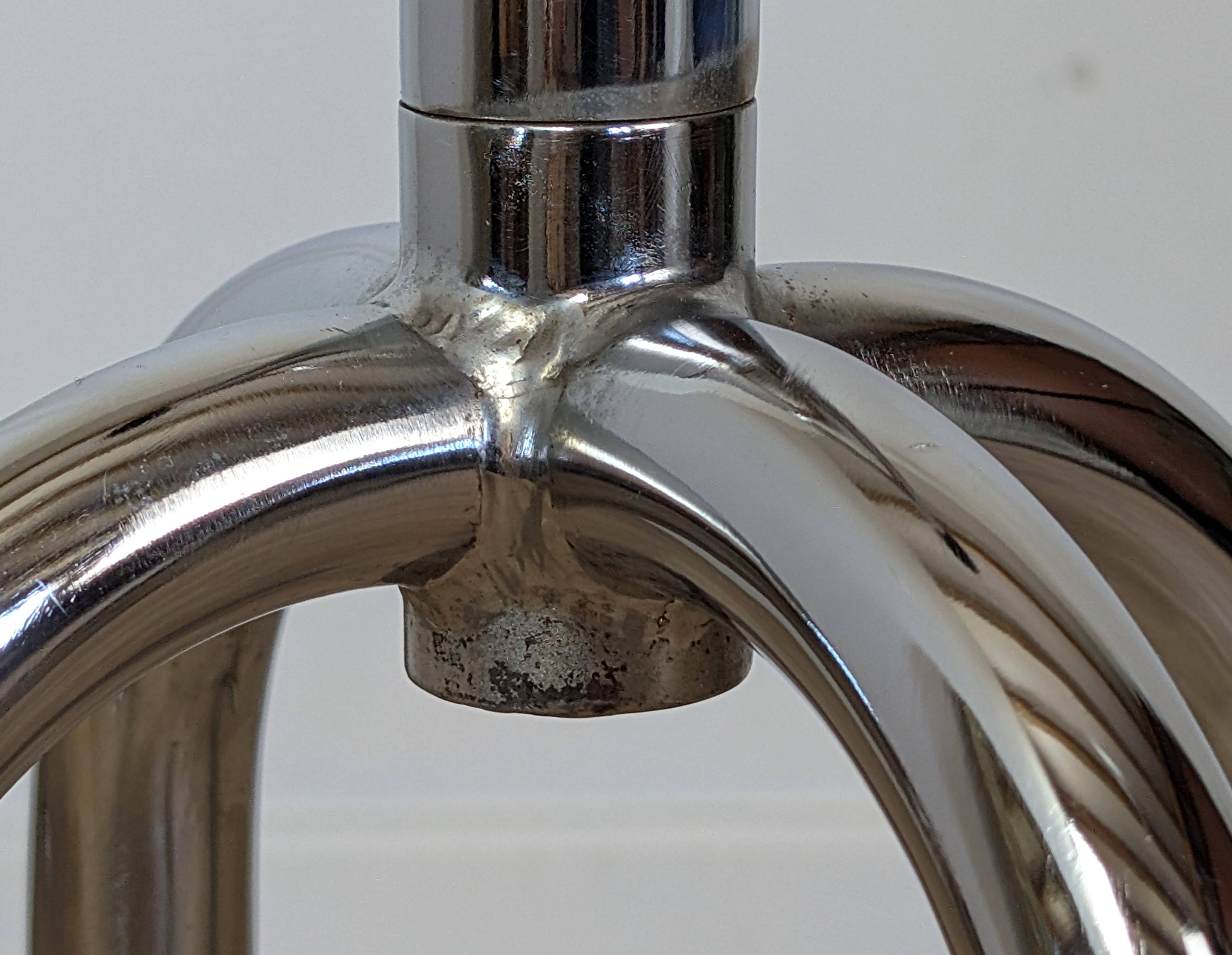 Chrome parrot coat rack