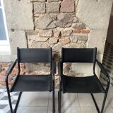Pair of black armchairs