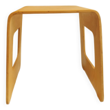 Design stool/side table made of curved plywood.