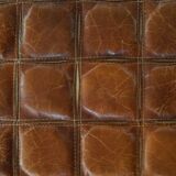 Mid-20th century pouf / ottoman cube in patinated brown leather, 1960s.