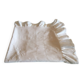 An antique embroidered duvet cover