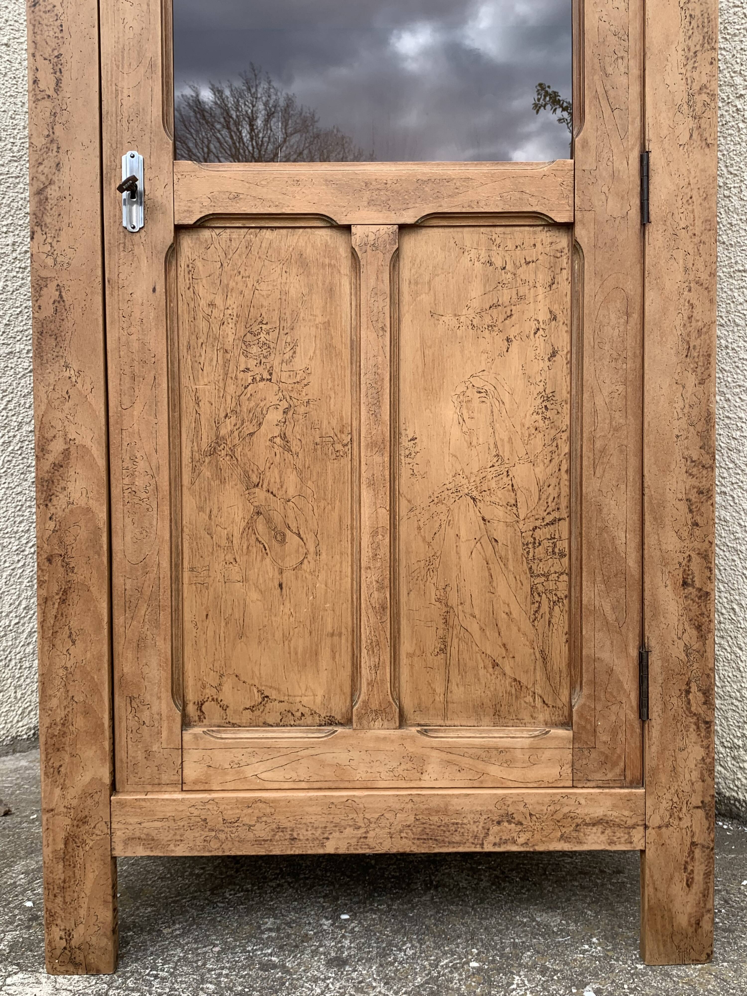 Parisian cabinet glazed raw wood nymphs and carved art nouveau decorations