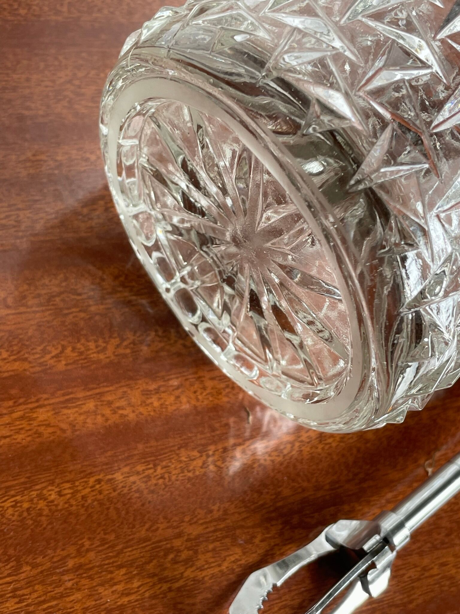 Vintage chiseled glass ice bucket with pliers
