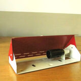 Wall lamp with red swivel shutter