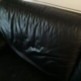 Natuzzi black leather sofa
