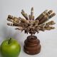 Antique sea urchin pencil on turned wooden base, 22 cm