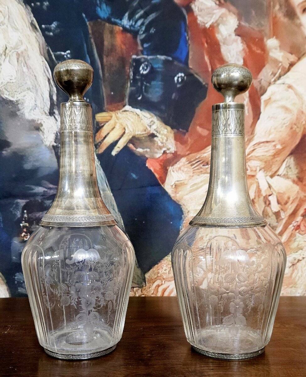 Pair of antique crystal and solid silver decanters.