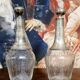 Pair of antique crystal and solid silver decanters.