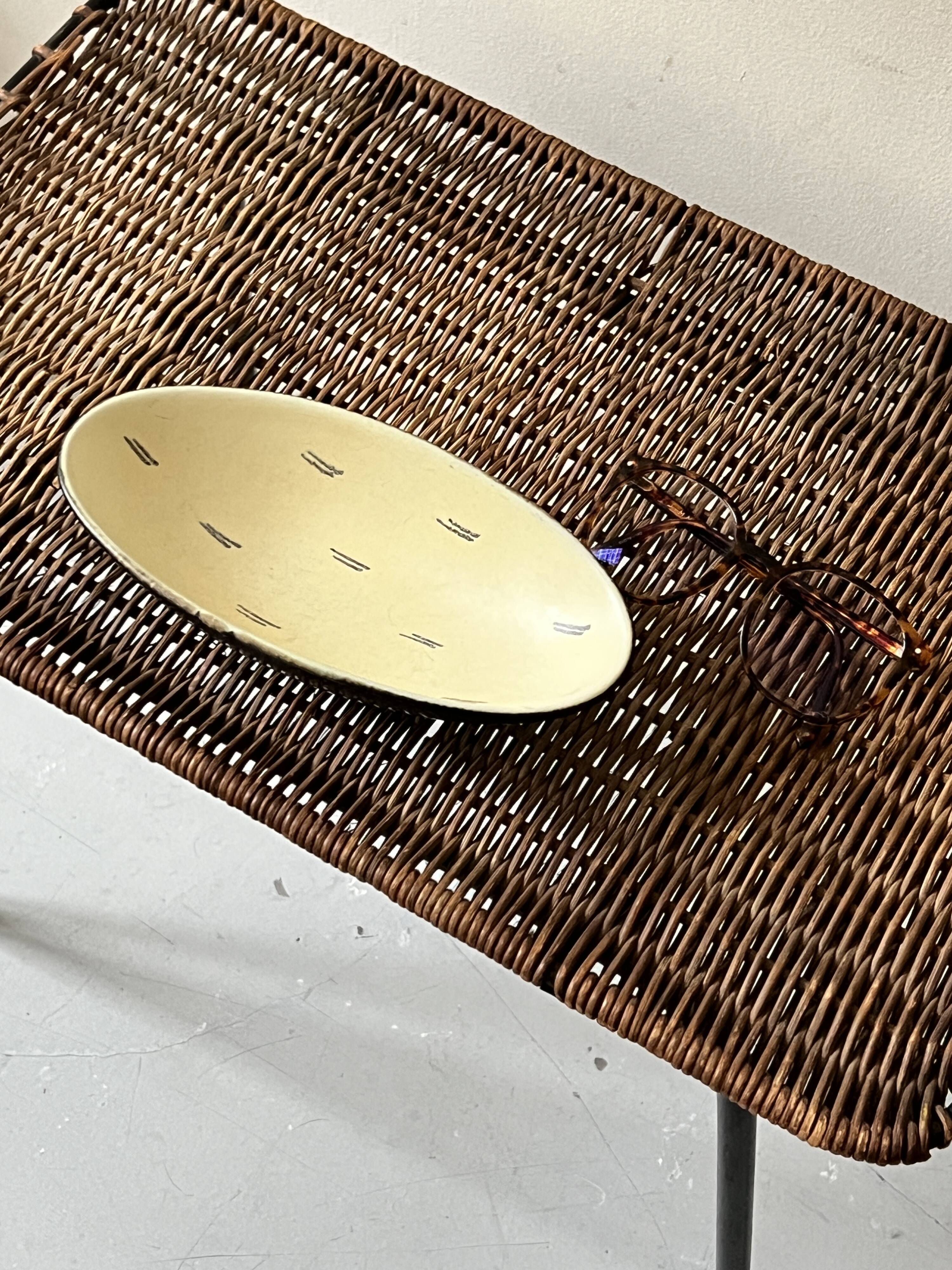 Pale yellow and black ceramic bowl / empty pocket signed by the artist