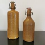 Set of 2 bottles in stoneware, organic decoration