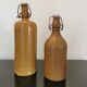 Set of 2 bottles in stoneware, organic decoration