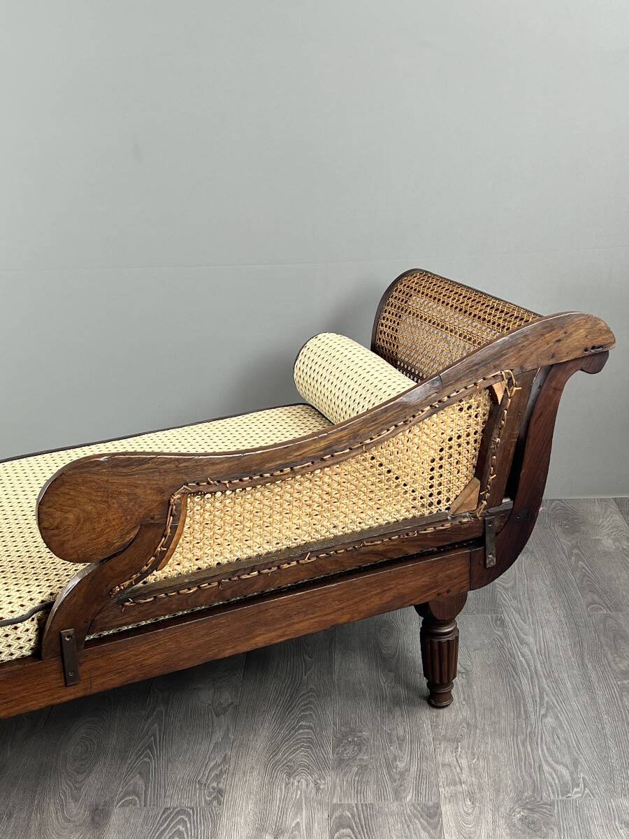 Louis XVI style meridian in carved wood and caning, 19th century.