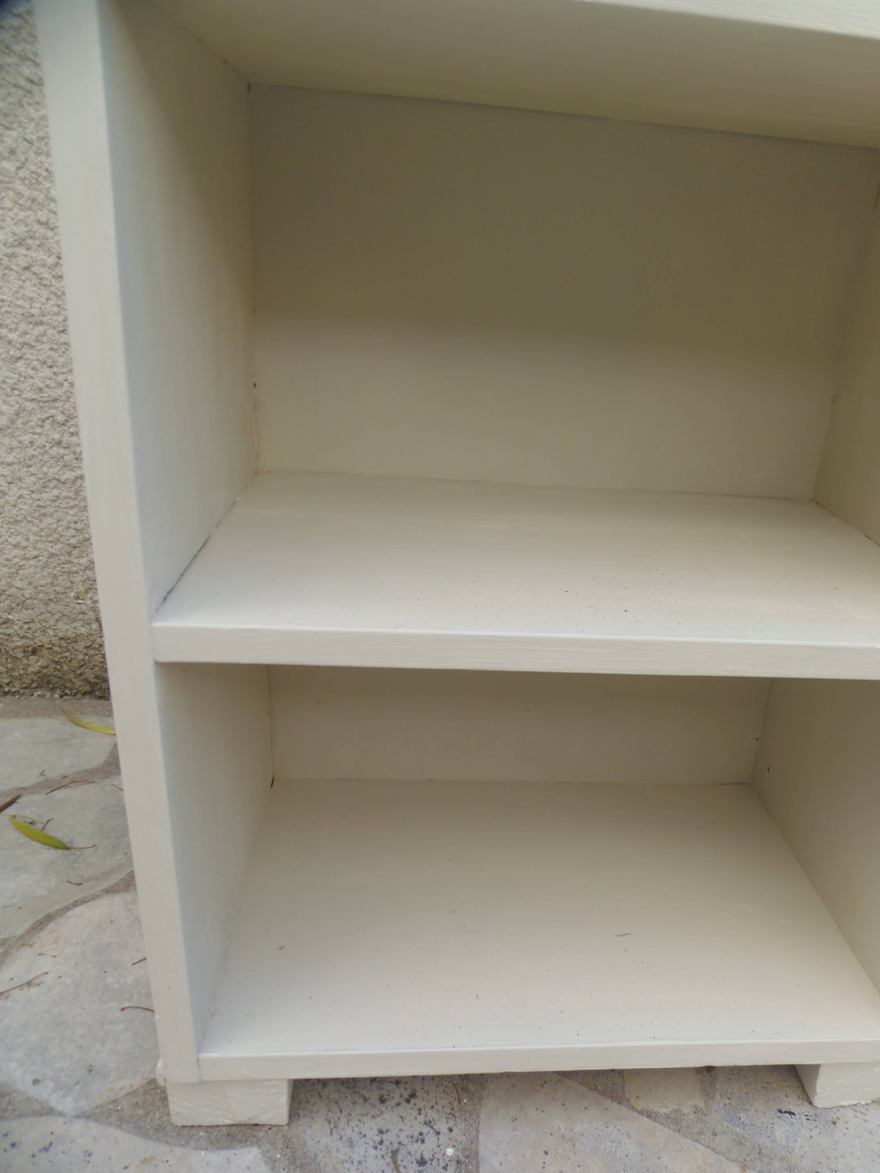 Renovated vintage 1950s library in beige.