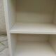 Renovated vintage 1950s library in beige.