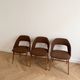 Set of 3 vintage 1960s chairs in wood and brown fabric.