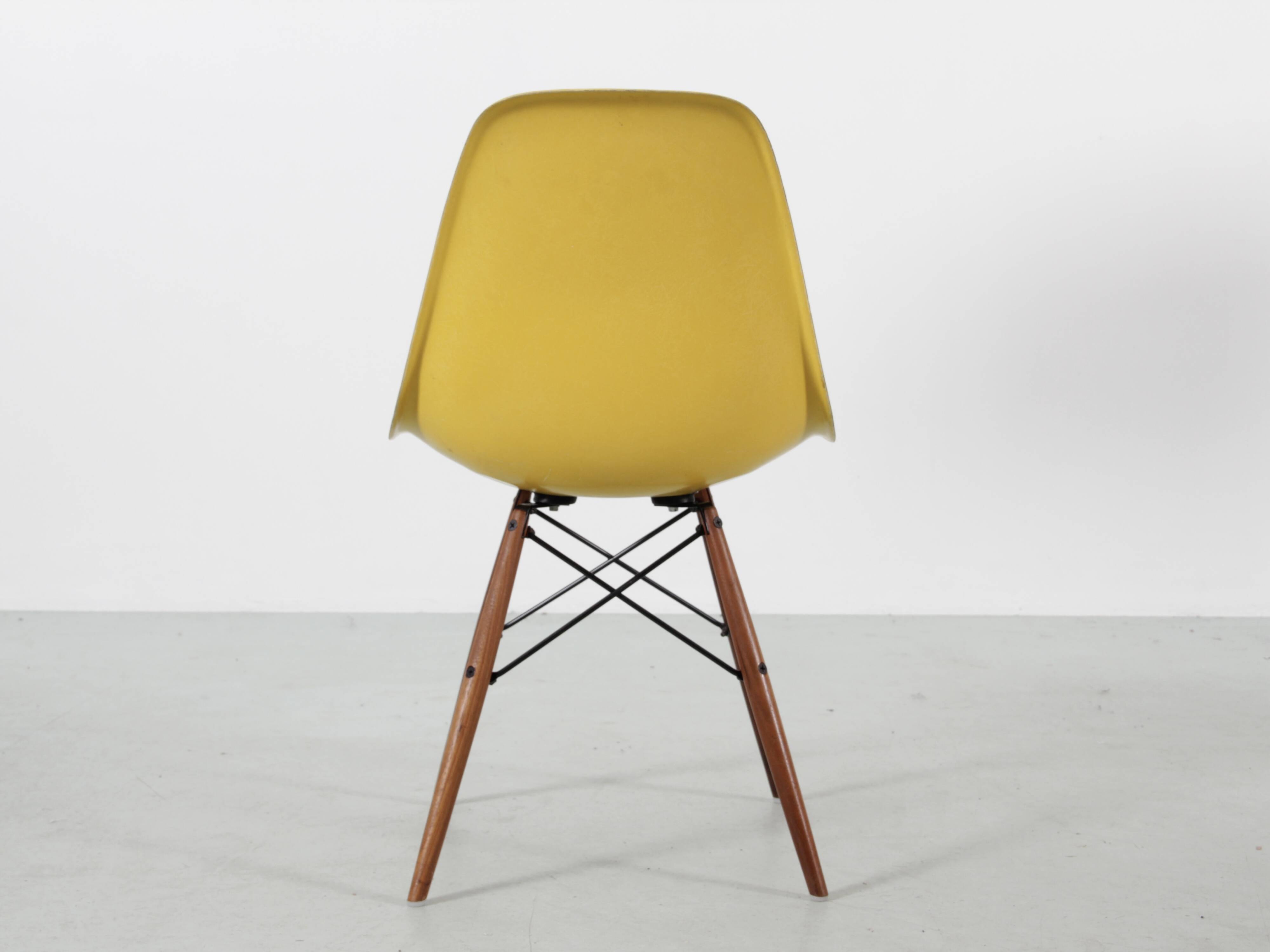 Set of 4 DSW chairs by Charles Eames - yellow fibreglass edition by Herman.