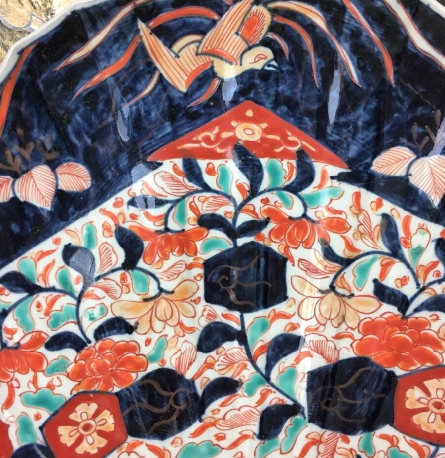 Imari porcelain dish from Japan in the shape of a scallop shell Blue, red and turquoise