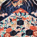 Imari porcelain dish from Japan in the shape of a scallop shell Blue, red and turquoise