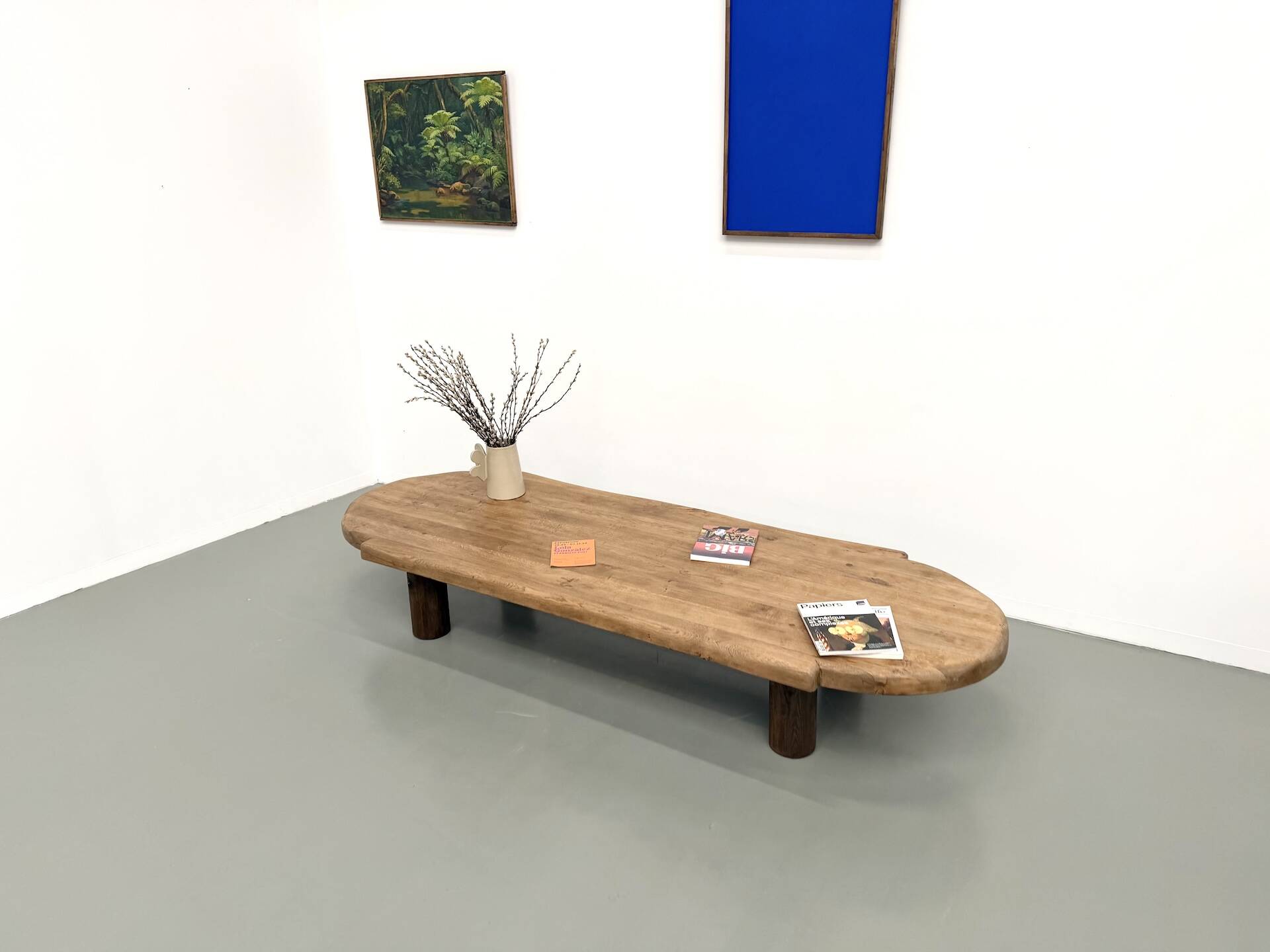 XXL oval coffee table in solid oak, cylindrical base, 1950s.