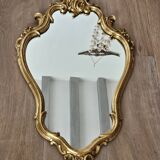 Rockery mirror under gilded frame