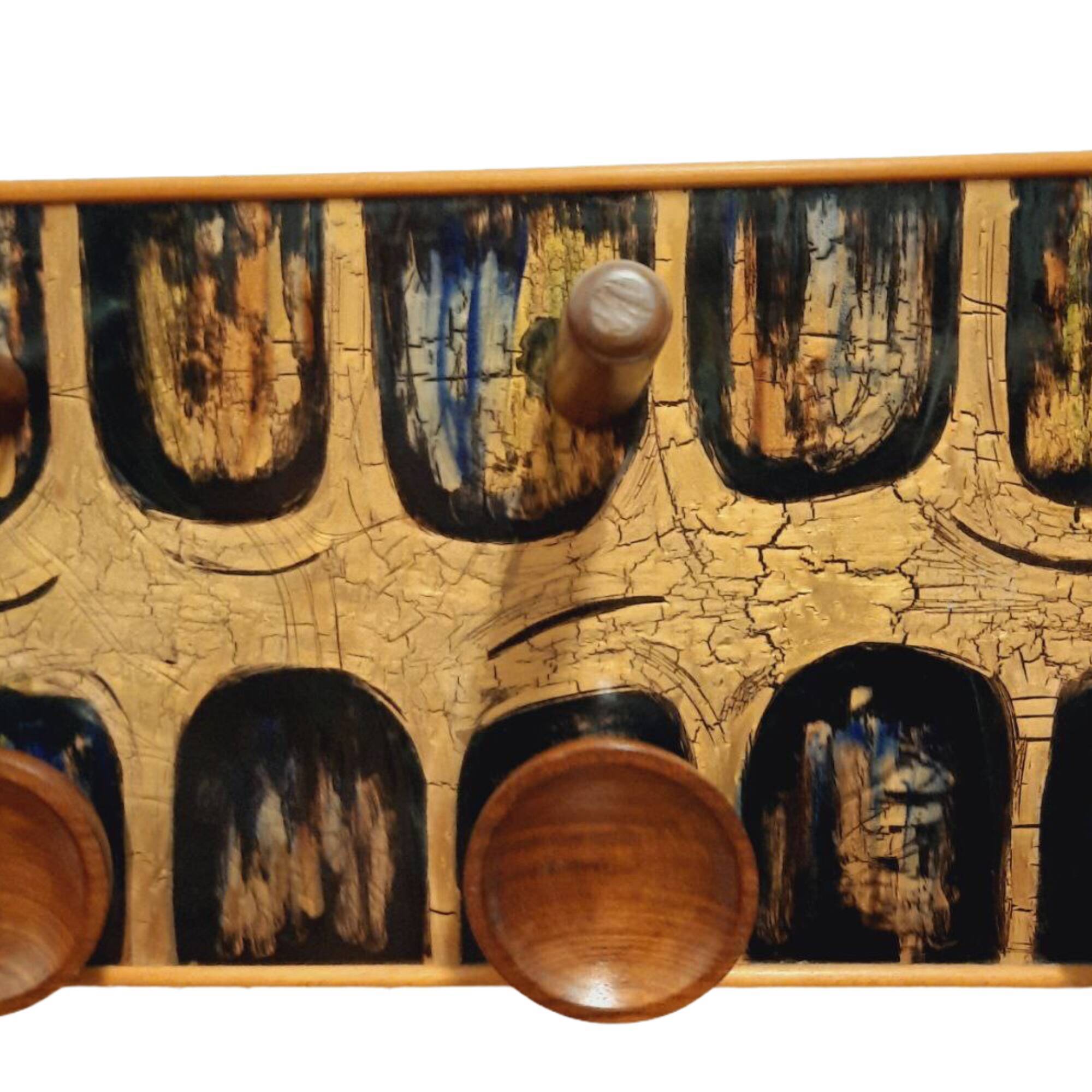 Vintage wooden coat hangers and glazed copper