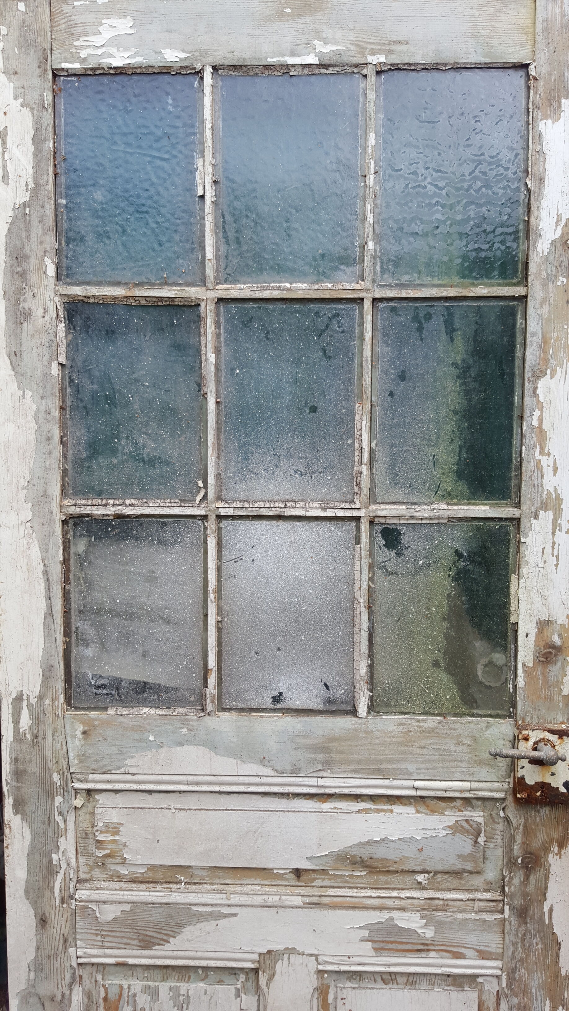 Old glass door beautiful patina. Height: 207.5 cm