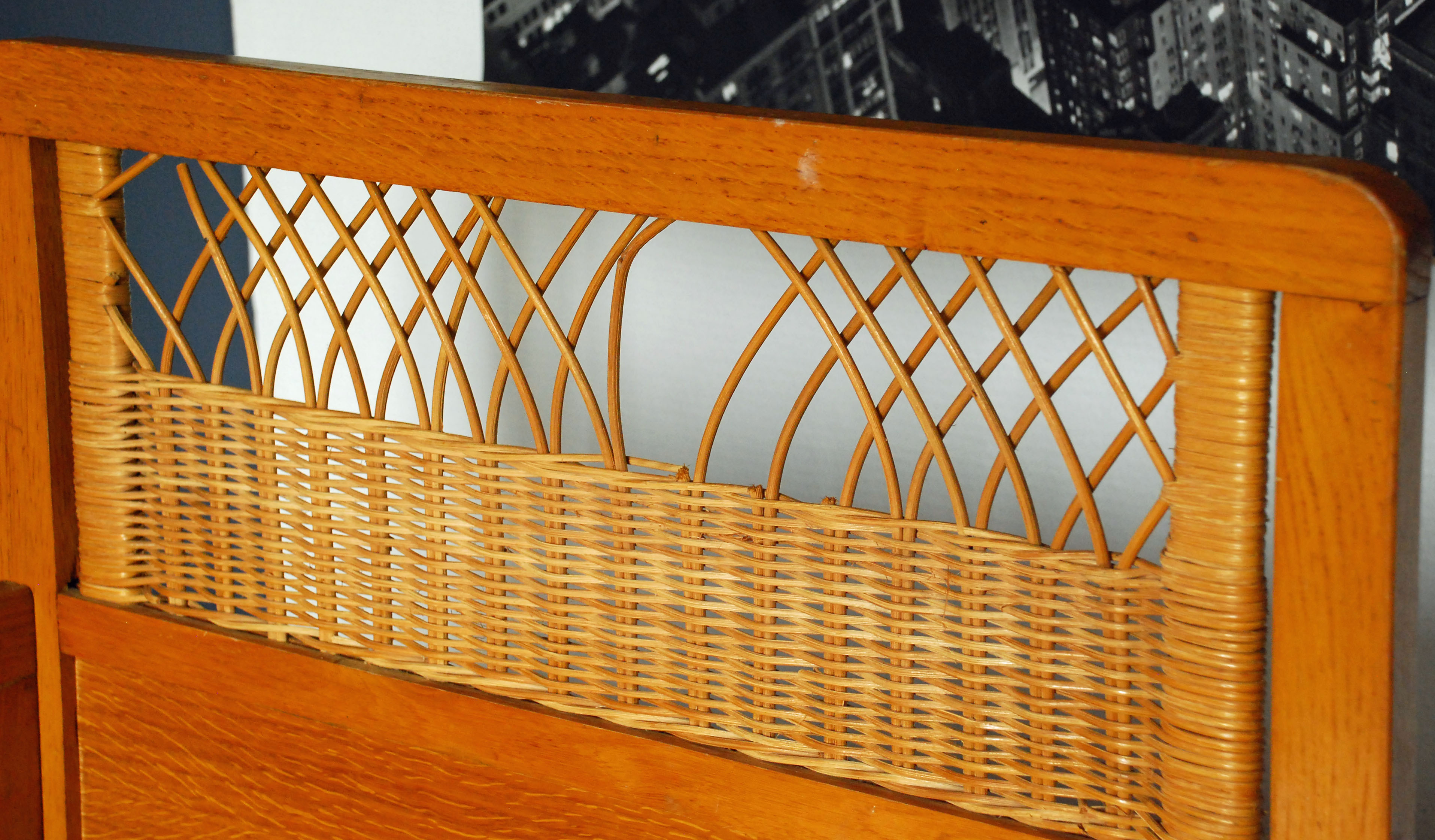 Wooden bed and vintage rattan