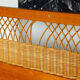 Wooden bed and vintage rattan