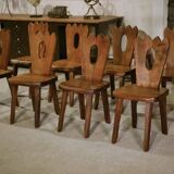 8 chaises brutalistes en orme massif par Aranjou 1950’s
