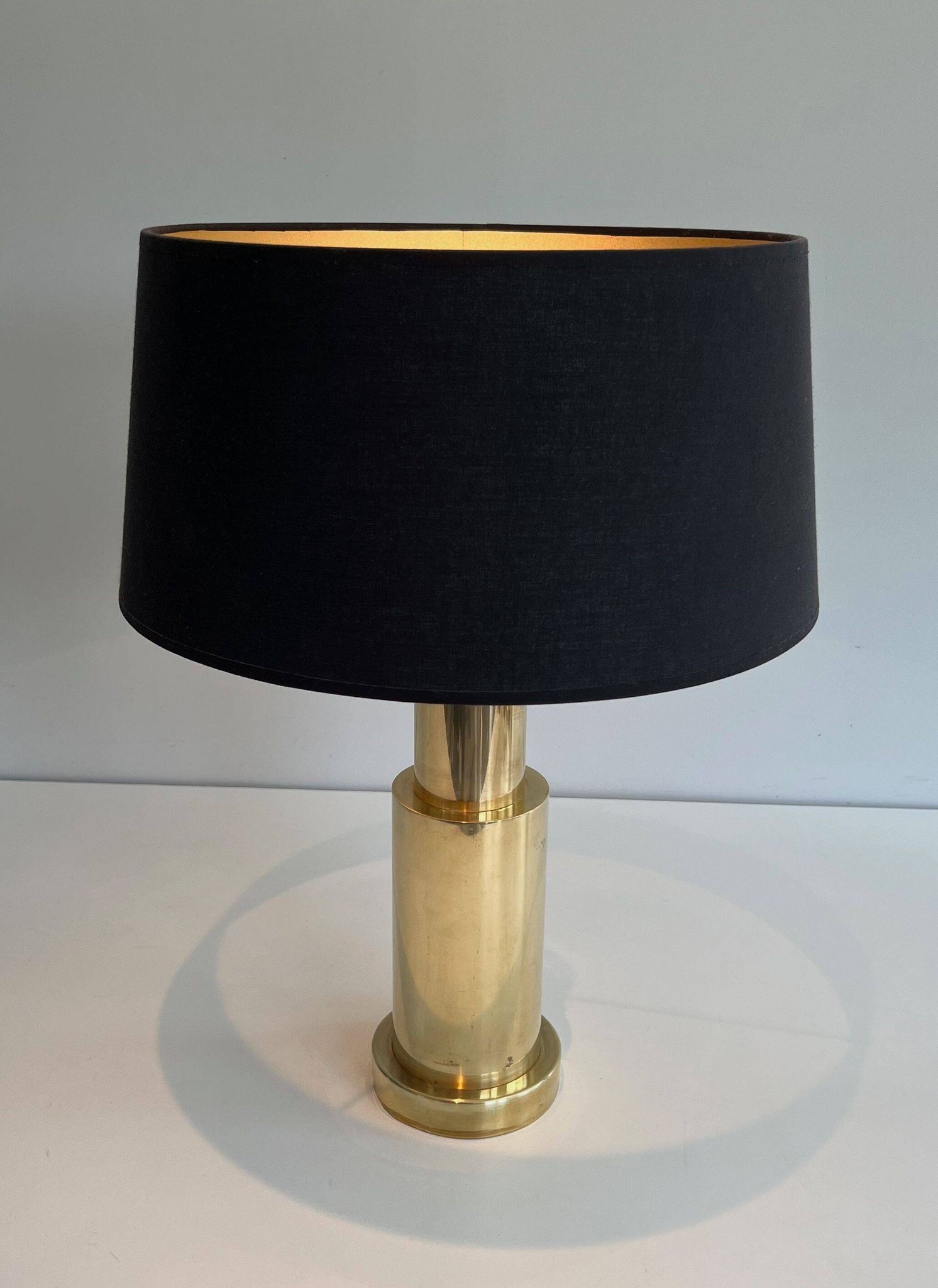 Pair of modernist brass lamps