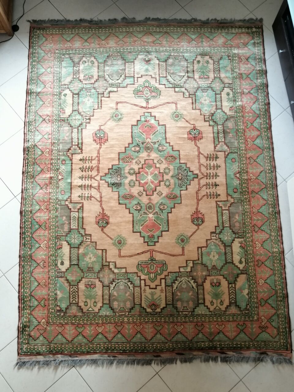 Afghan rug in pastel colors