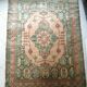 Afghan rug in pastel colors