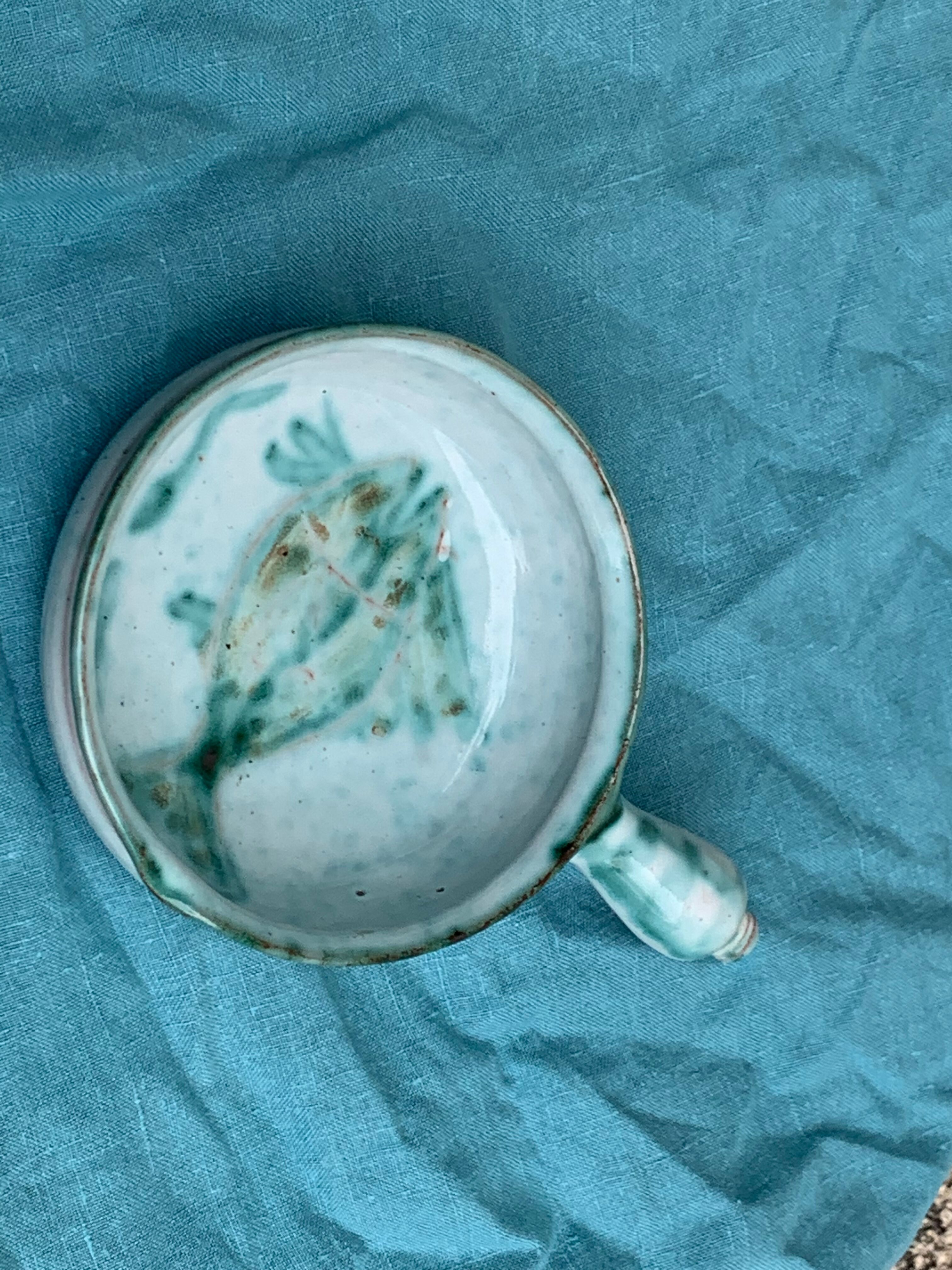 Caquelon, pan sign Humbert pittari vallauris model with blue glazed ceramic fish