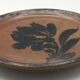 Lot 2 assiettes en grès pyrité émaillé à décor floral h. siegfried, souffle