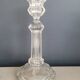 Old candlestick with molded glass stamps
