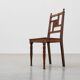Art Deco oak side chair with carved rosette back and turned front legs, Bel