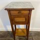 Provincial oak furniture, marble top, ceramic interior.