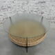 Vintage coffee table with glass top and rattan basket