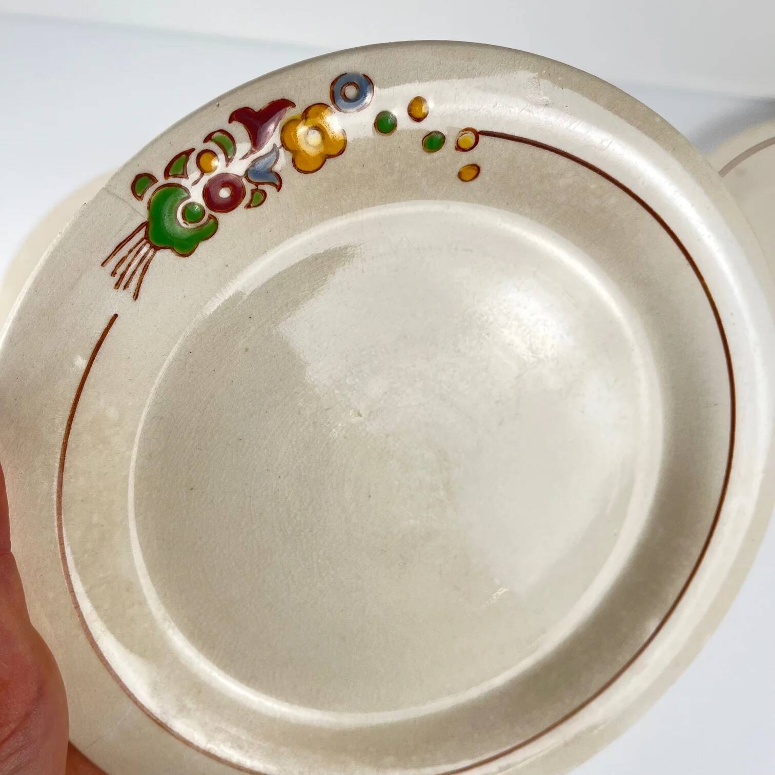 Set of 5 dessert plates Longwy, early 20th century, floral decoration.