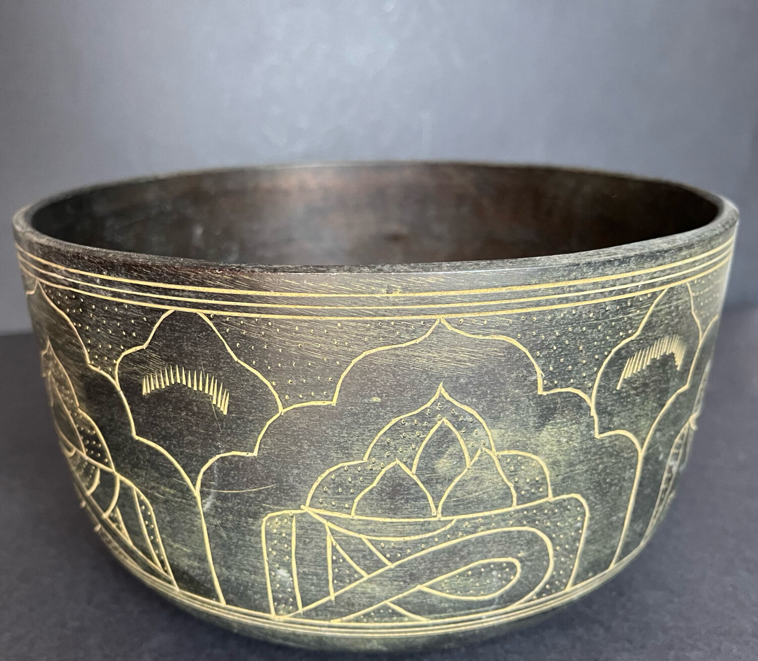 Carved bronze cup