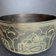 Carved bronze cup