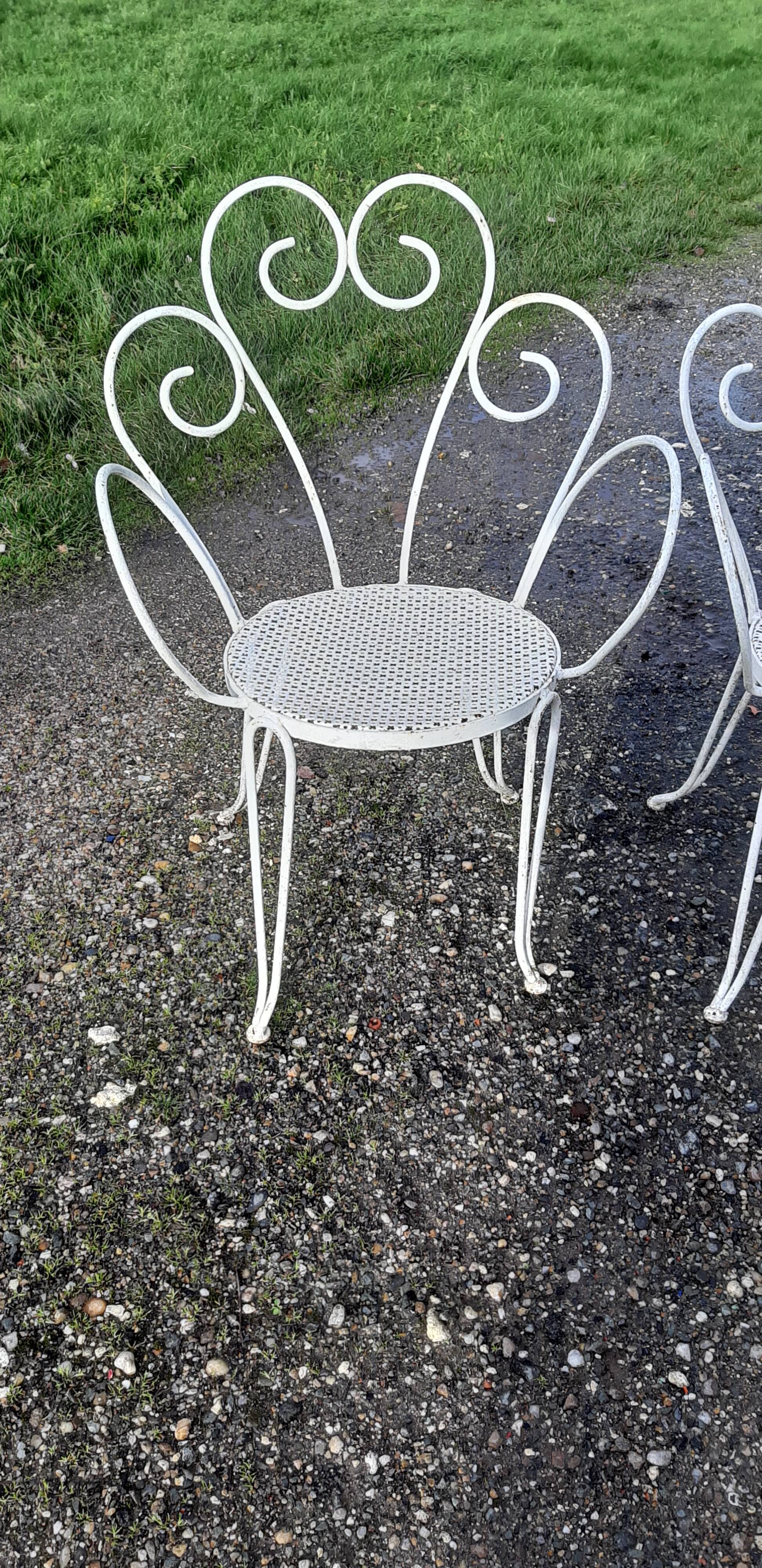 Paire de fauteuils de jardin 1900 en fer forgé