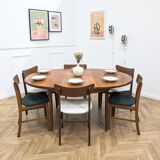 Round and extendable dining table published by G-Plan