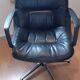 Sedinternational black leather swivel armchair