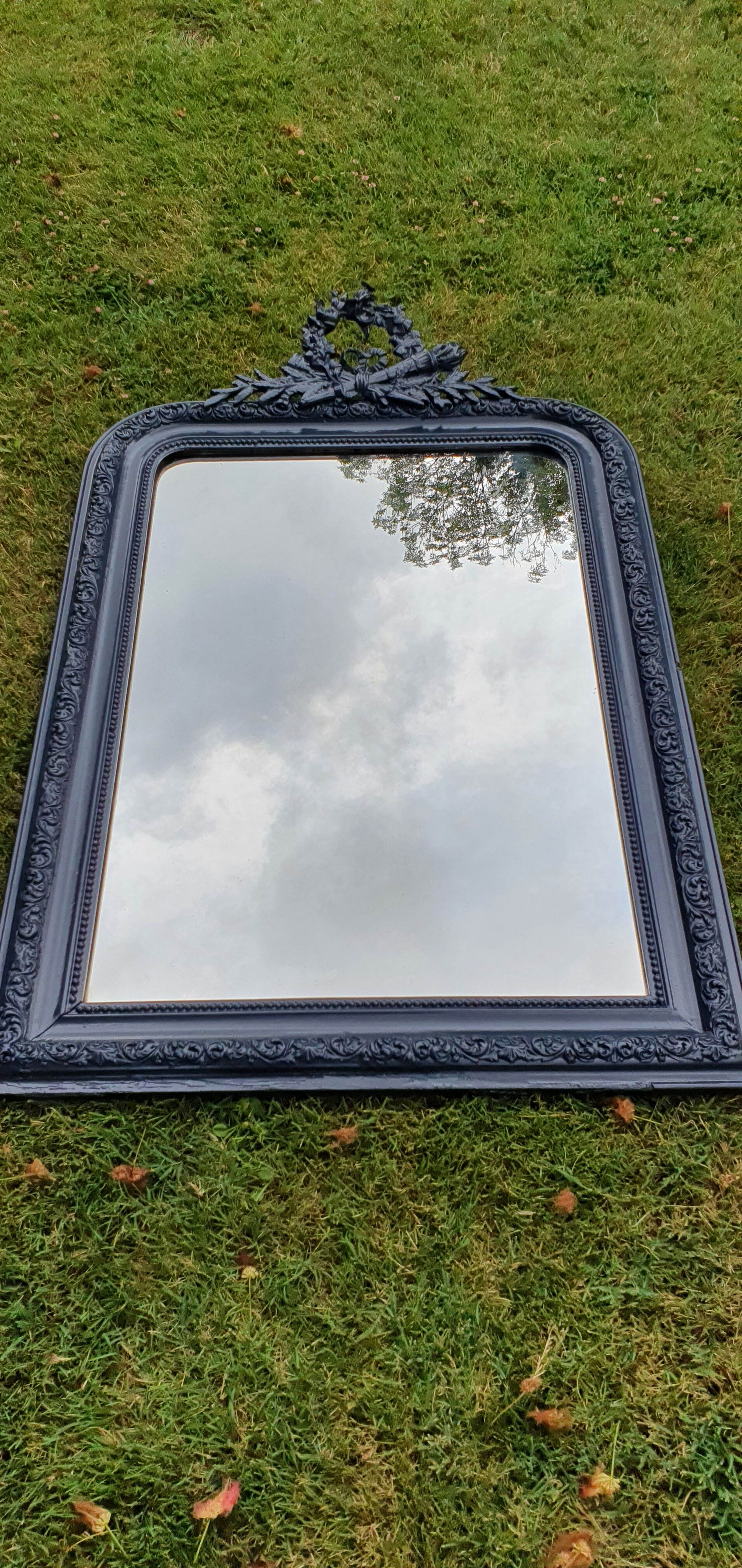 Old mirror Louis Philippe anthracite gray with pricked ice.